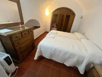 Cama o camas de una habitación en Casa Cueva la estación