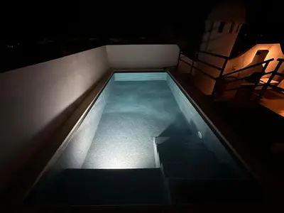 Piscina en o cerca de Atico duplex con piscina privada, solárium y barbacoa