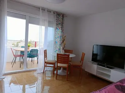 Una televisión o centro de entretenimiento en Apartamento en Calarreona