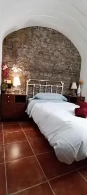 Cama o camas de una habitación en Cueva En El Geoparque de Granada