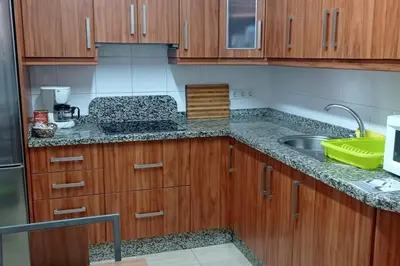 Una cocina o zona de cocina en Apartamento sol playa deportes