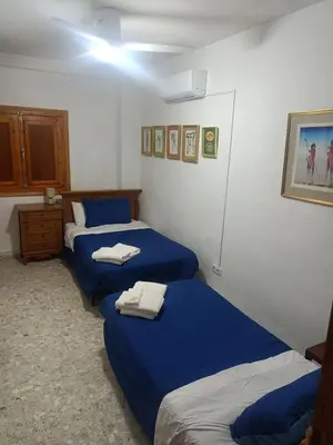 Cama o camas de una habitación en Casa De Aventuras ideal for large groups