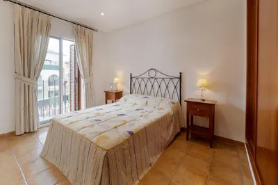 Cama o camas de una habitación en R2307 Al Andalus Residencial Vera Playa Almería