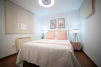 Cama o camas de una habitación en Guadix Catedral
