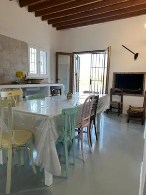 Una televisión o centro de entretenimiento en Cortijo MAMANGUEÑA PISCINA Y CUEVA