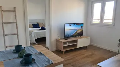 Una televisión o centro de entretenimiento en CT 344 AL - Faro's Teckel Apartments Geminis Sky