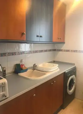 Una cocina o zona de cocina en Apartamento Naturista Torremar