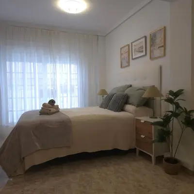 Cama o camas de una habitación en apartamento alma
