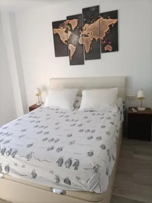Cama o camas de una habitación en Alminares Playa 3 dormitorios