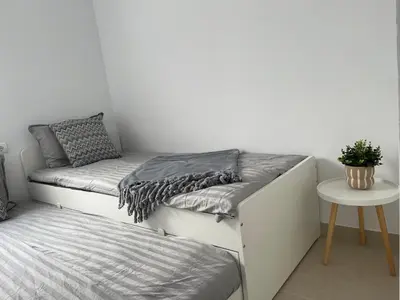 Cama o camas de una habitación en Breeze 5