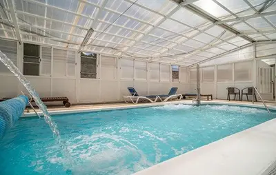 Piscina en o cerca de 1- Casa Rural con Piscina Climatizada