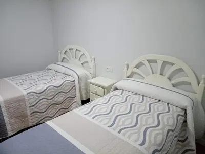 Cama o camas de una habitación en Alojamiento Rural La Tahona Gorafe