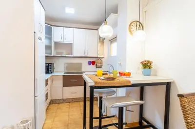 Una cocina o zona de cocina en TrendyHomes Retamar III - Playa, piscina y golf