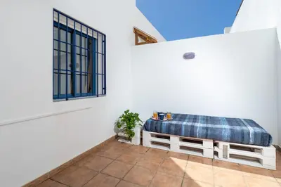 Cama o camas de una habitación en Casa Ardisia, con terraza y aparcamiento