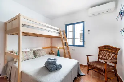 Cama o camas de una habitación en Casa Ardisia, con terraza y aparcamiento
