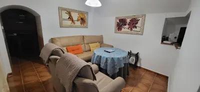 Zona de estar de Alojamiento La tinaja