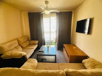 Zona de estar de Apartamento en última planta 4 recien reformado en Playa La Colonia con Ascensor