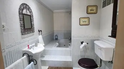Un baño de Suite privada con terraza chill out