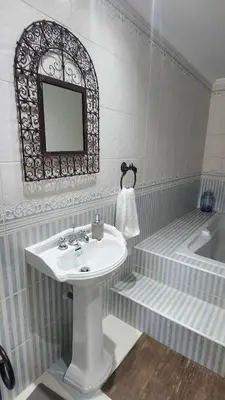 Un baño de Suite privada con terraza chill out
