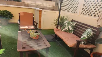 Zona de estar de Suite privada con terraza chill out