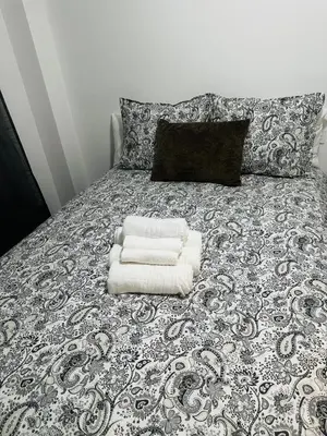 Cama o camas de una habitación en HABITACIONES A COMPARTIR EN APARTAMENTO RECIÉN REFORMADO EN PLAYa LA COLONIA