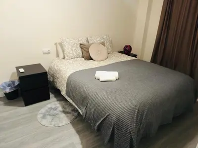 Cama o camas de una habitación en HABITACIONES A COMPARTIR EN APARTAMENTO RECIÉN REFORMADO EN PLAYa LA COLONIA