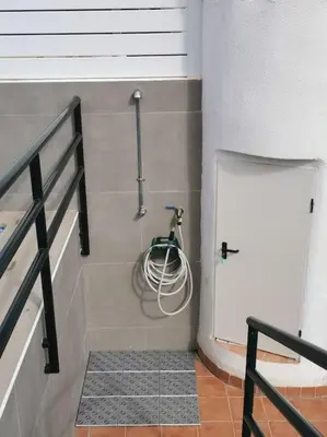 Un baño de Oasis Vera, Atico con piscina privada