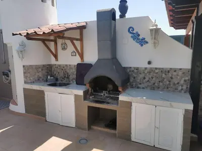 Barbacoa disponible para clientes en el apartamento