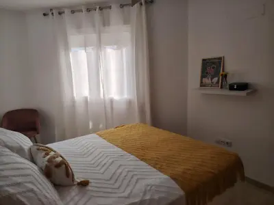 Cama o camas de una habitación en La Casita del Marqués