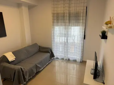 Zona de estar de Precioso y luminoso apartamento junto al mar y playa en Garrucha 1B