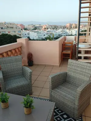 Zona de estar de Sun an relax at the Puertomar beach