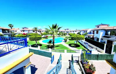 Piscina en o cerca de Ático VERAMAR 1 frente a piscina dos dormitorios
