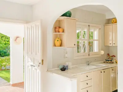 Una cocina o zona de cocina en Precioso apartamento con jardín en Mojacar playa