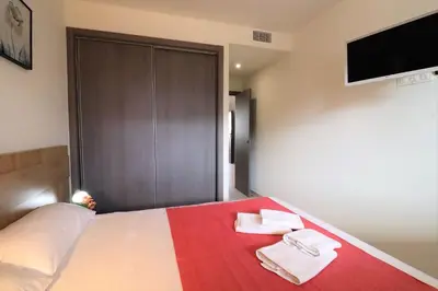 Cama o camas de una habitación en Azucenas, apto en residencial de lujo.