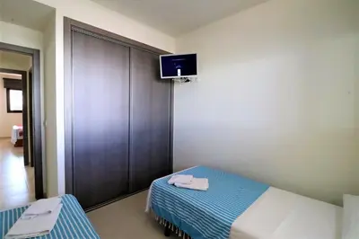 Cama o camas de una habitación en Azucenas, apto en residencial de lujo.