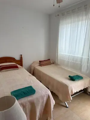 Cama o camas de una habitación en El Palmeral Cabo de Gata