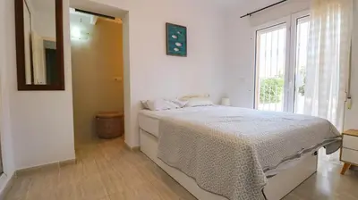 Cama o camas de una habitación en Vila Guapa - Villa de dos dormitorios en San Juan de los Terreros