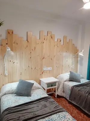 Cama o camas de una habitación en El suéño de Fondón