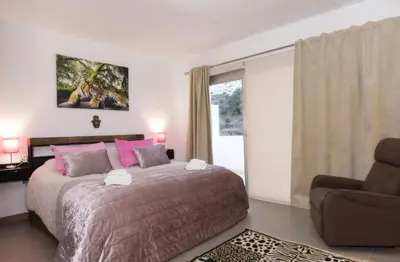 Cama o camas de una habitación en La Villa Dorada