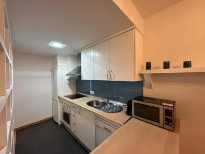 Una cocina o zona de cocina en Alborada Ático - junto a playa