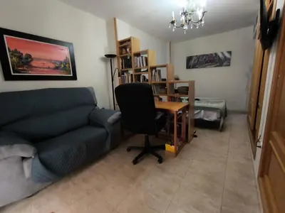 Zona de estar de Estudio con terraza junto al mar