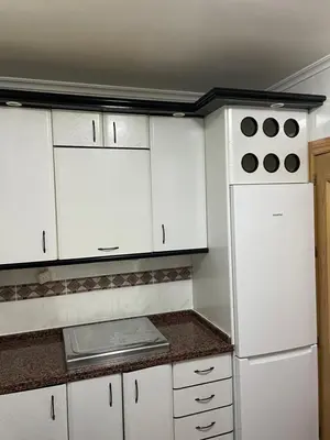 Una cocina o zona de cocina en Piso Guadix Pablo