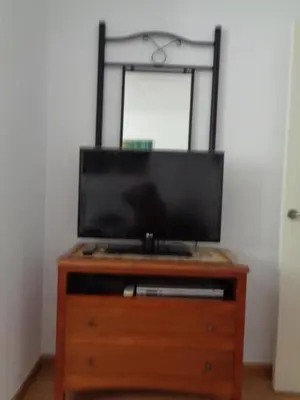 Una televisión o centro de entretenimiento en Vera Natura Eden