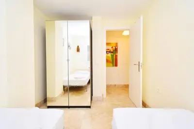 Cama o camas de una habitación en Expoholidays - Porto fino 2 dormitorios
