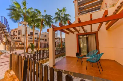 Un balcón o terraza de Los Collados con Jardín y Piscina By Aloha Palma