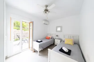Cama o camas de una habitación en Los Genoveses 6