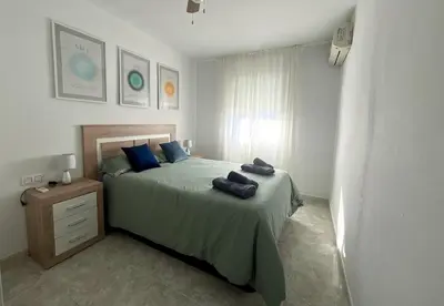 Cama o camas de una habitación en Duplex de dos dormitorios en Vera Playa