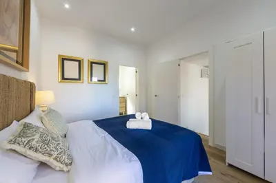 Cama o camas de una habitación en AlmeriaSuite Villa Las Golondrinas