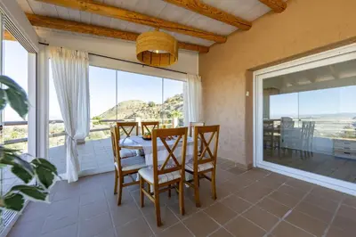 Un balcón o terraza de AlmeriaSuite Villa Las Golondrinas