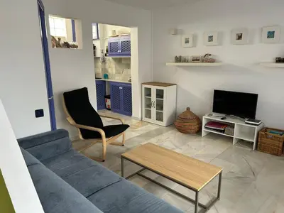 Una televisión o centro de entretenimiento en Casa Gata